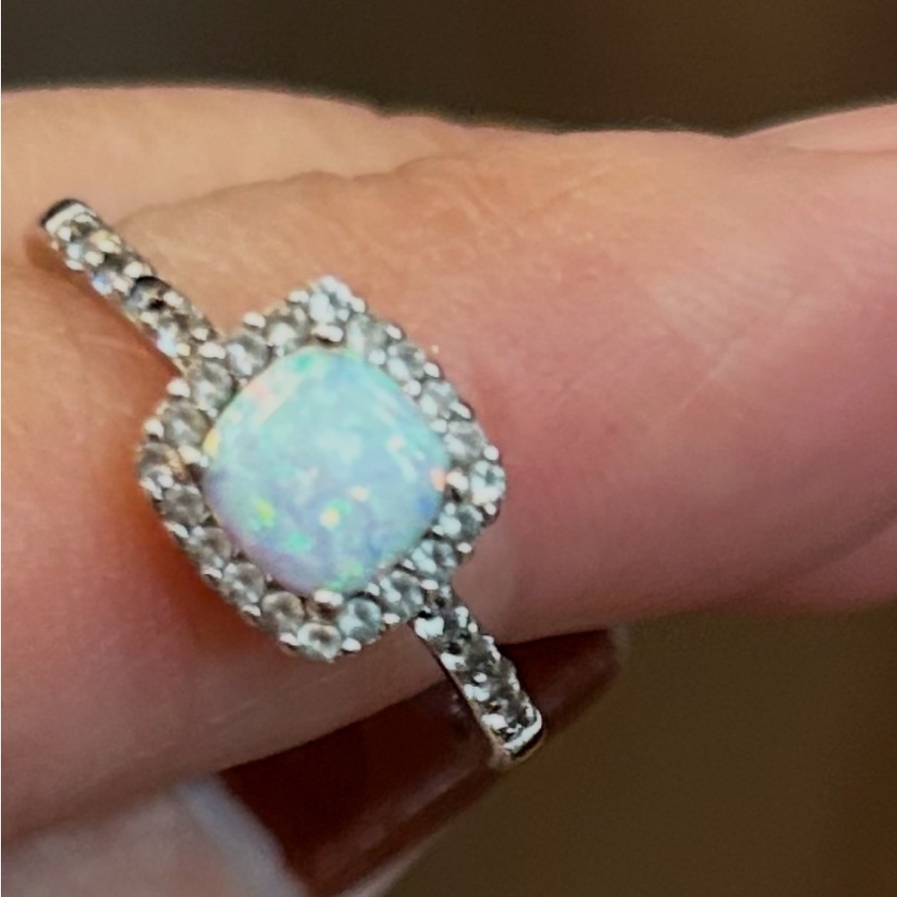 Opal with diamonds ring